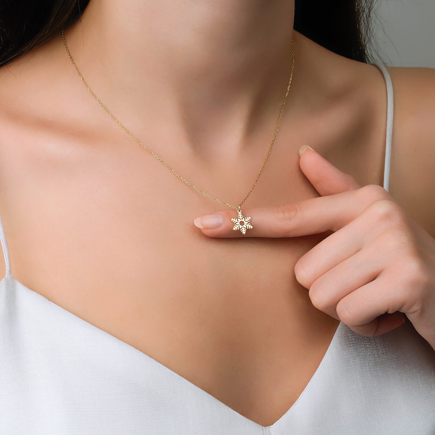snowflake charm necklace in solid gold