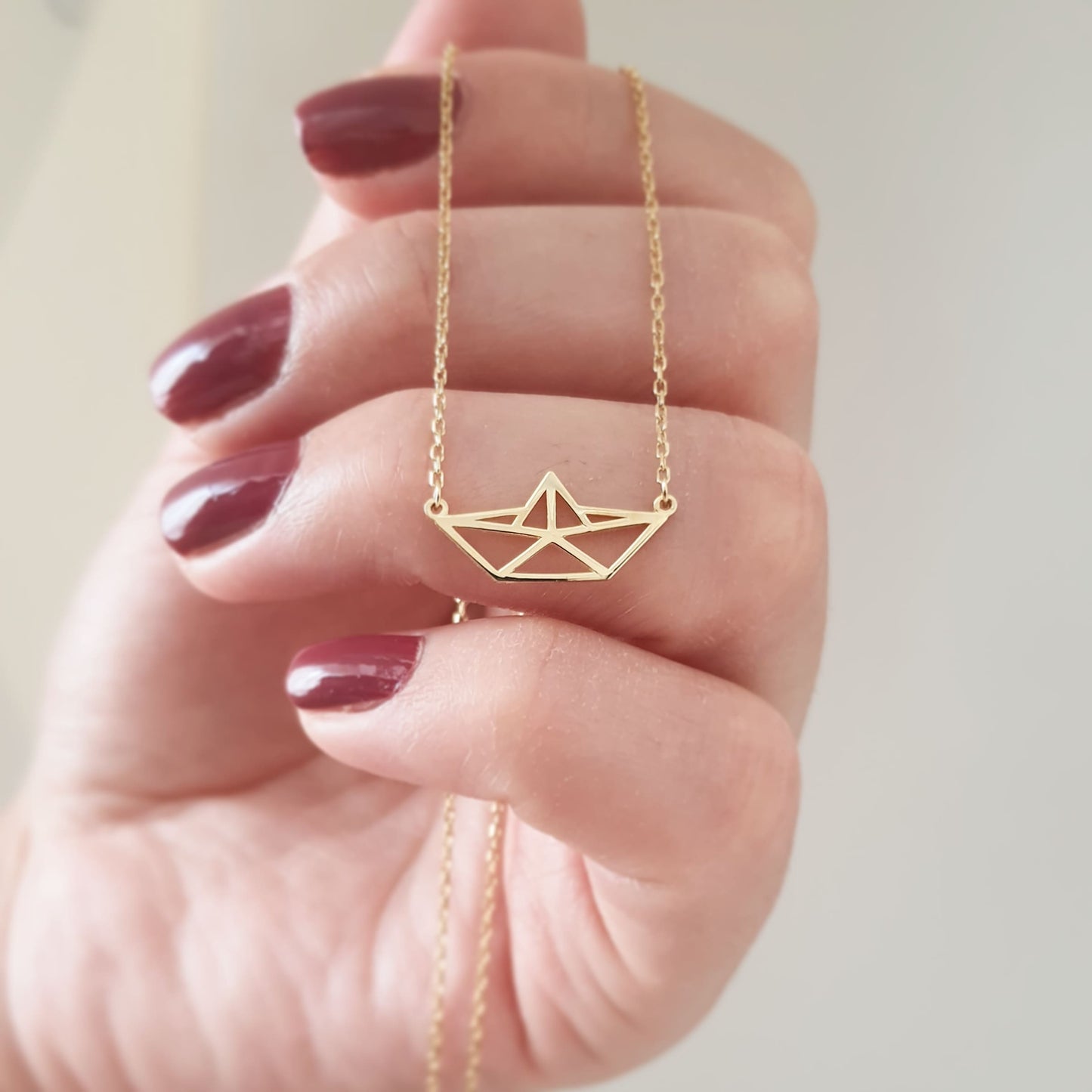 dainty solid gold nautical theme necklace