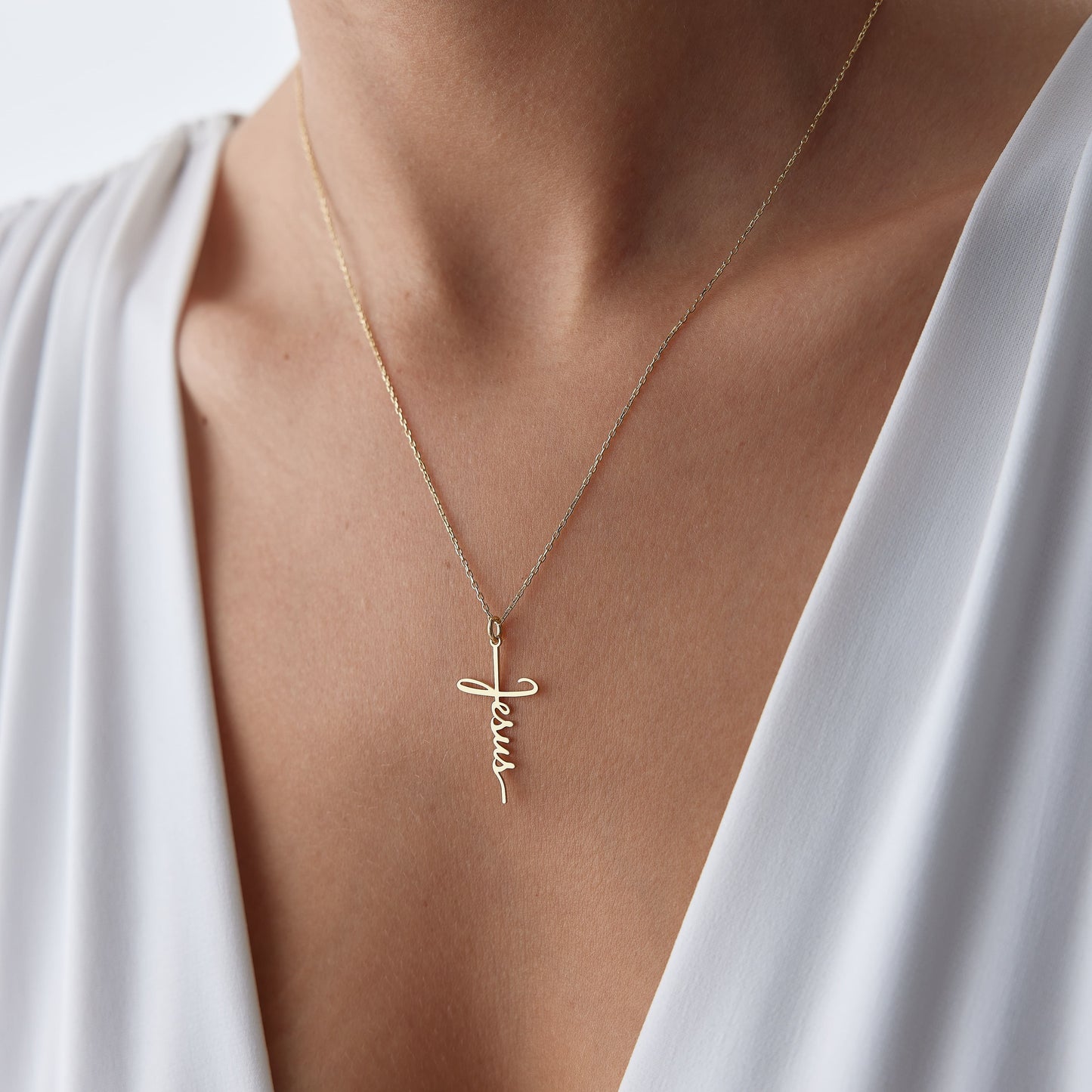14k gold faith necklace with Jesus pendant