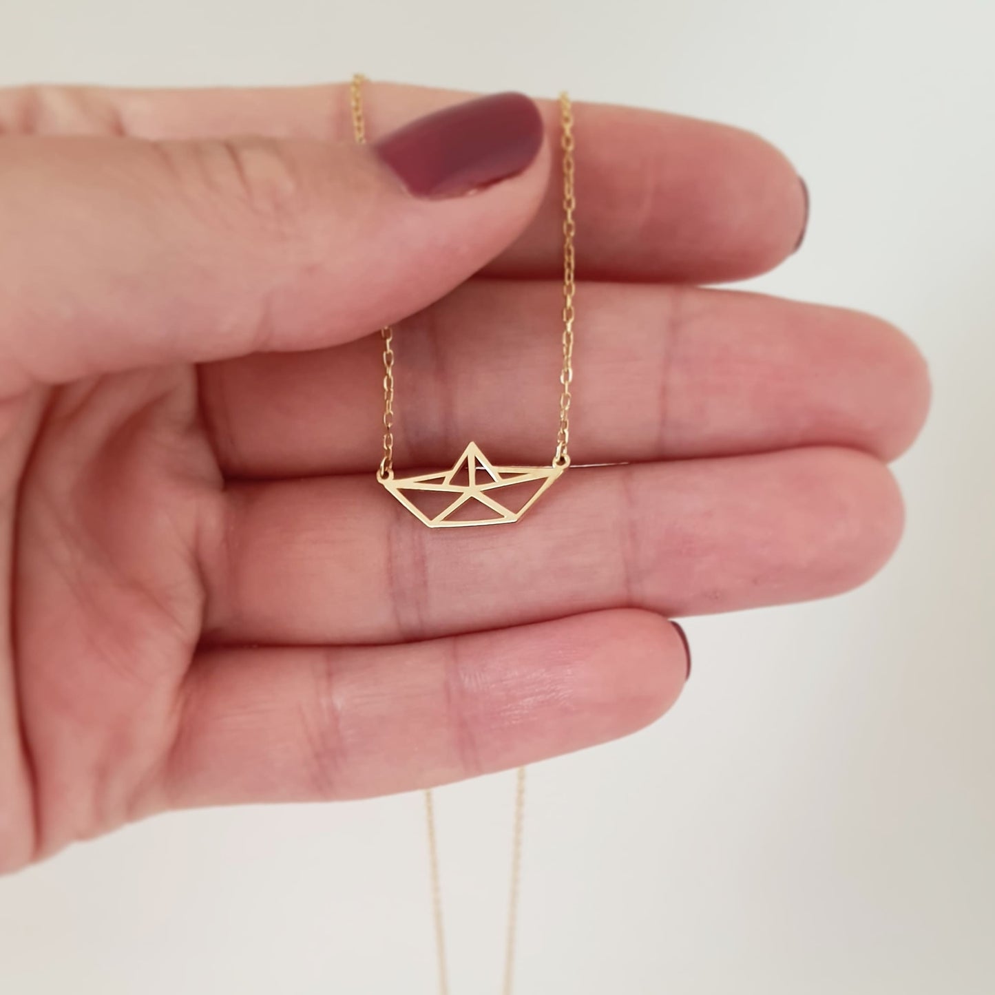 minimalist gold sailboat necklace travel jewelry