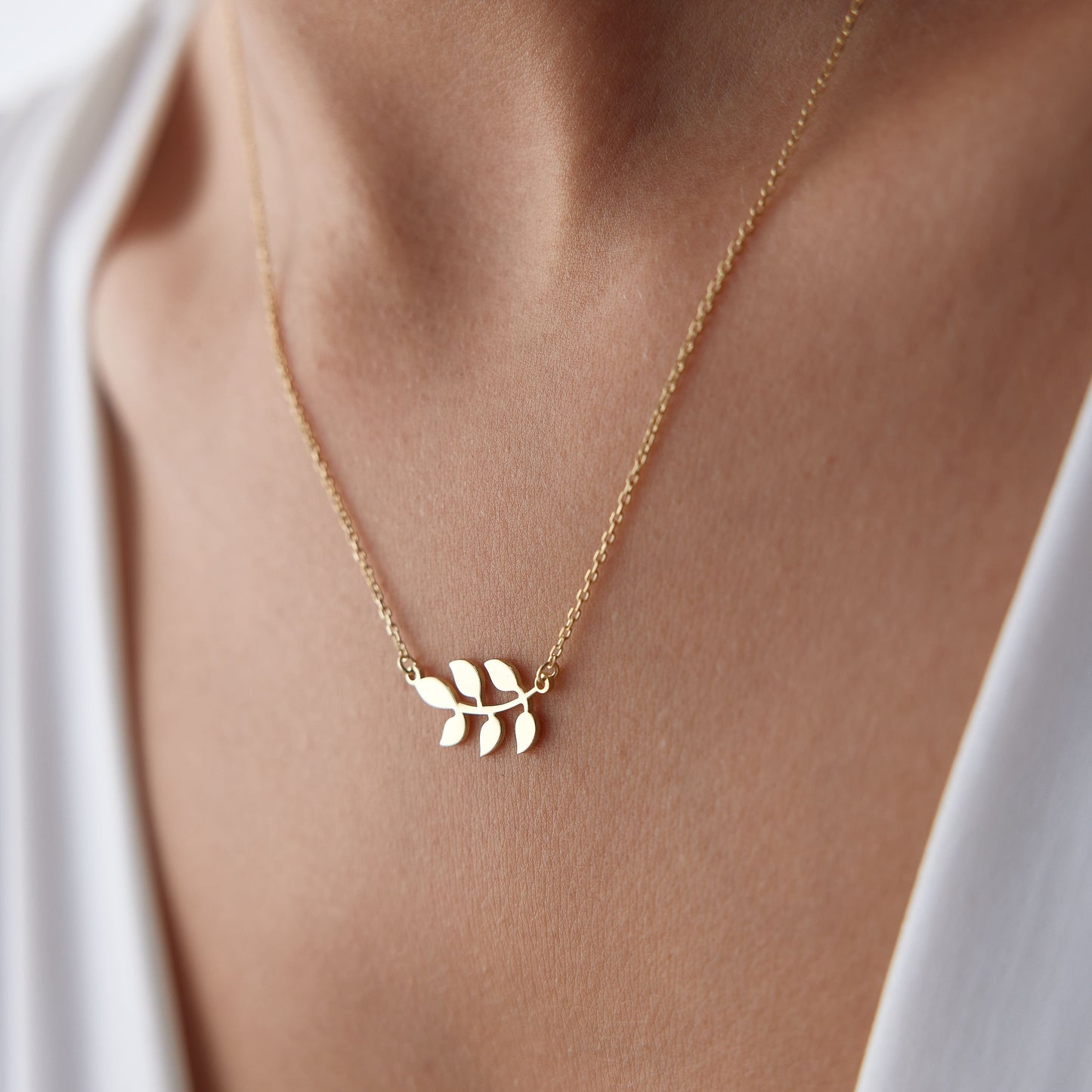 dainty gold growth necklace