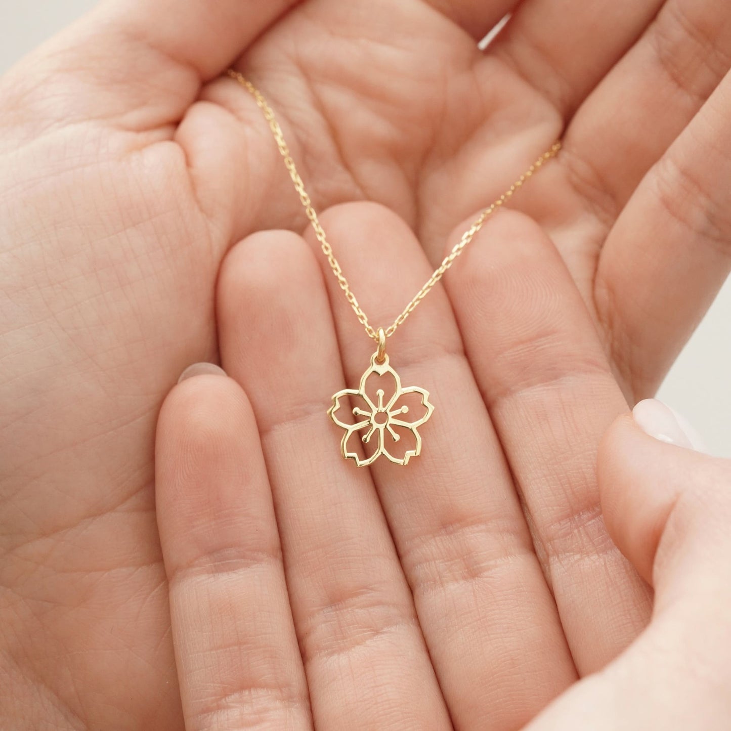 gold springtime floral pendant