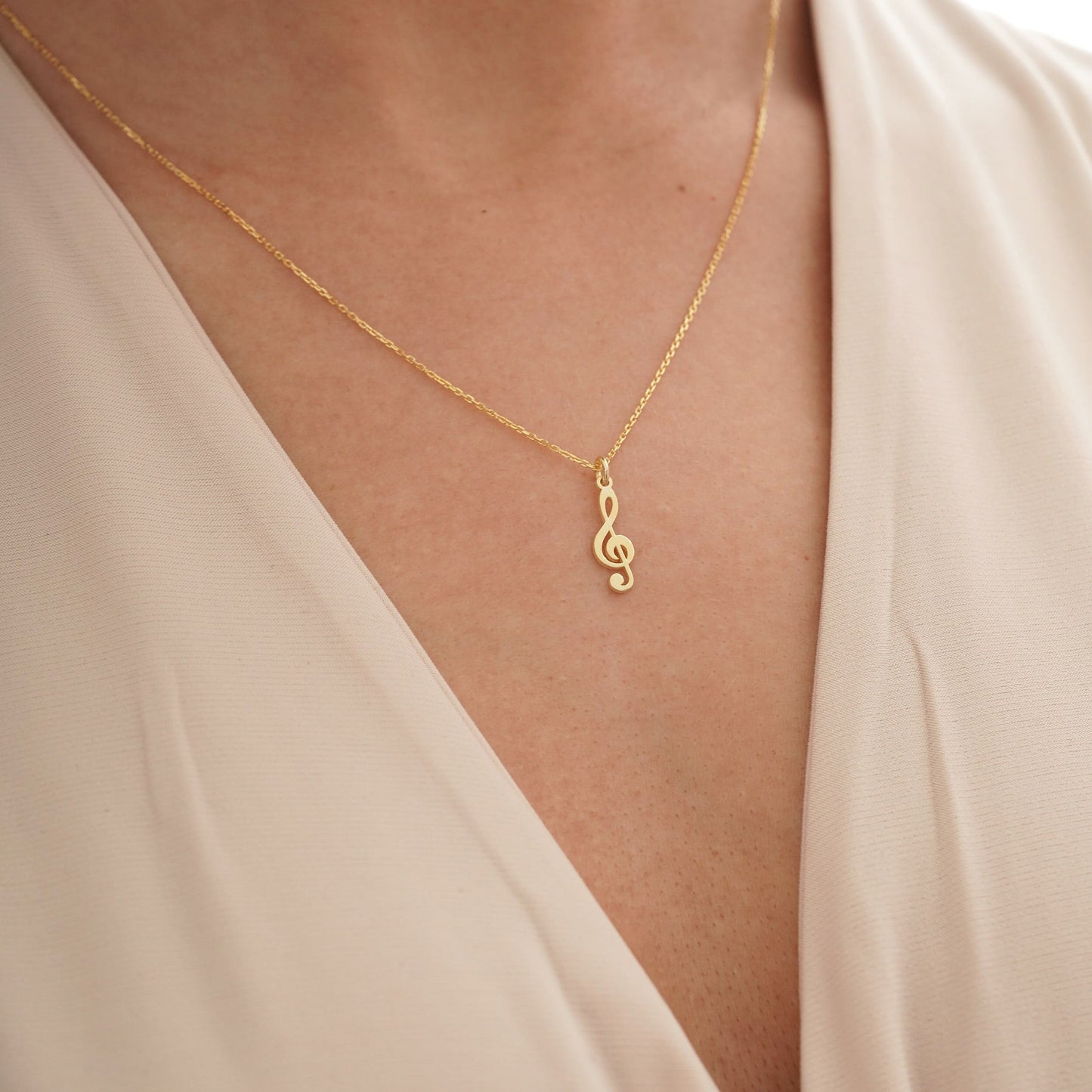 music-themed solid gold necklaces