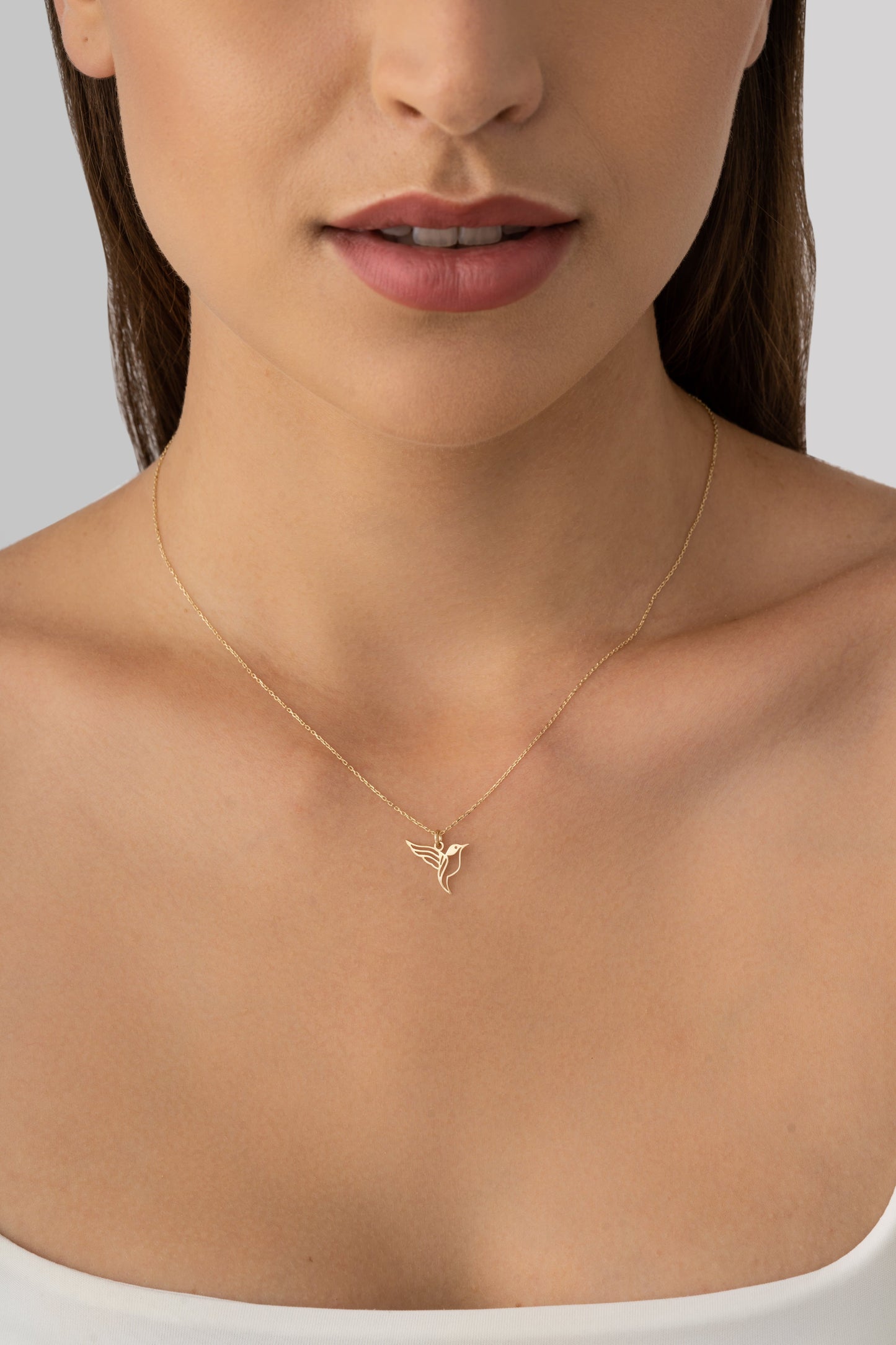 flying bird gold pendant necklace