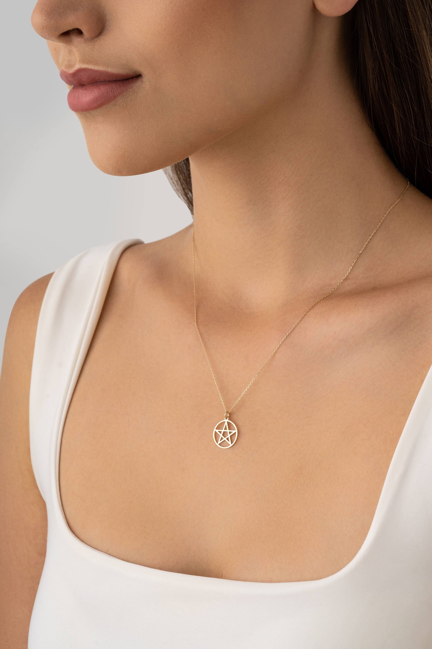 protection symbol necklace in gold
