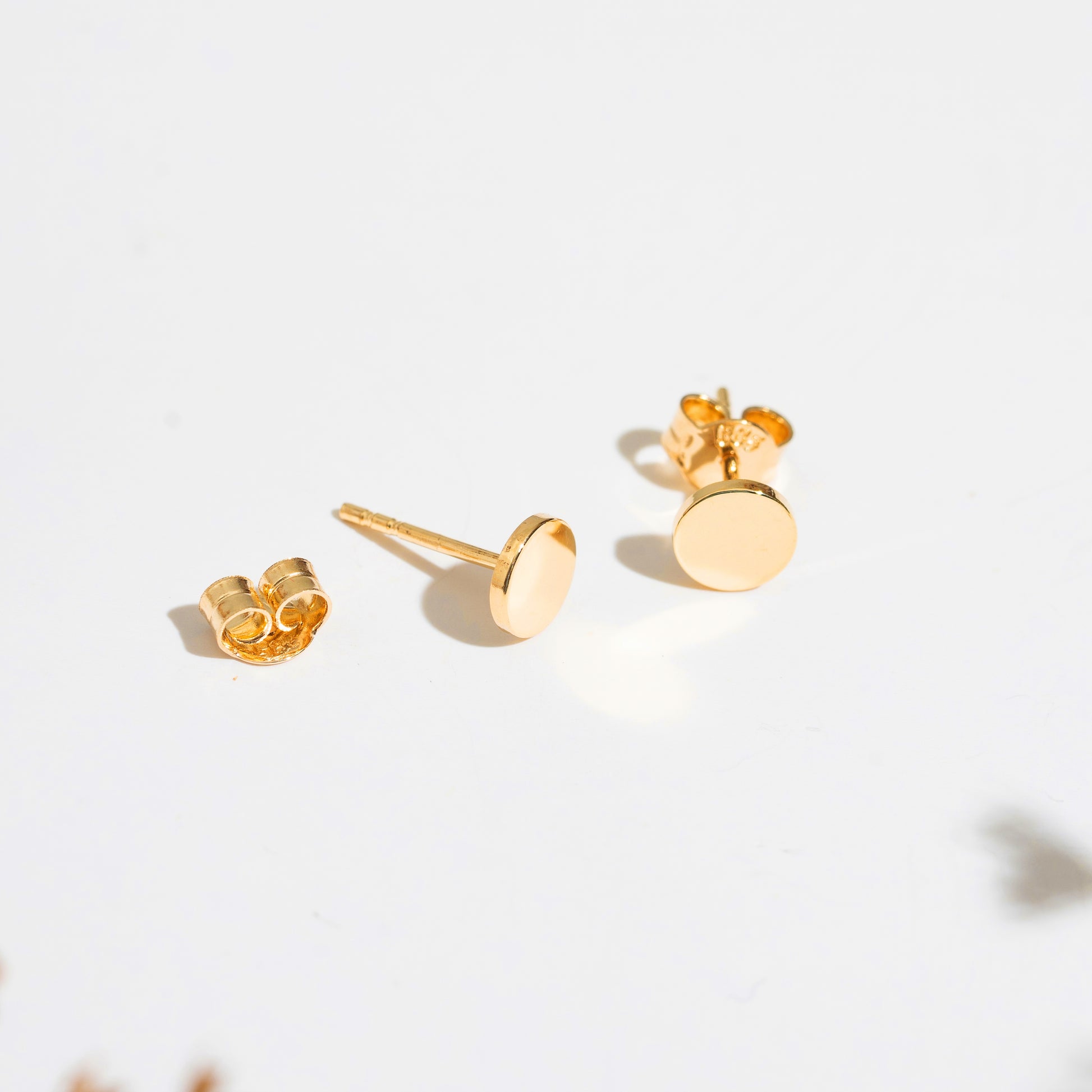 round gold studs