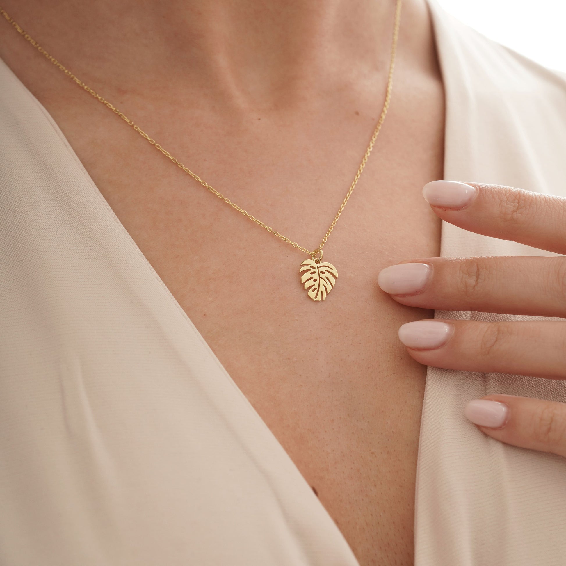 solid gold dainty monstera pendant necklace