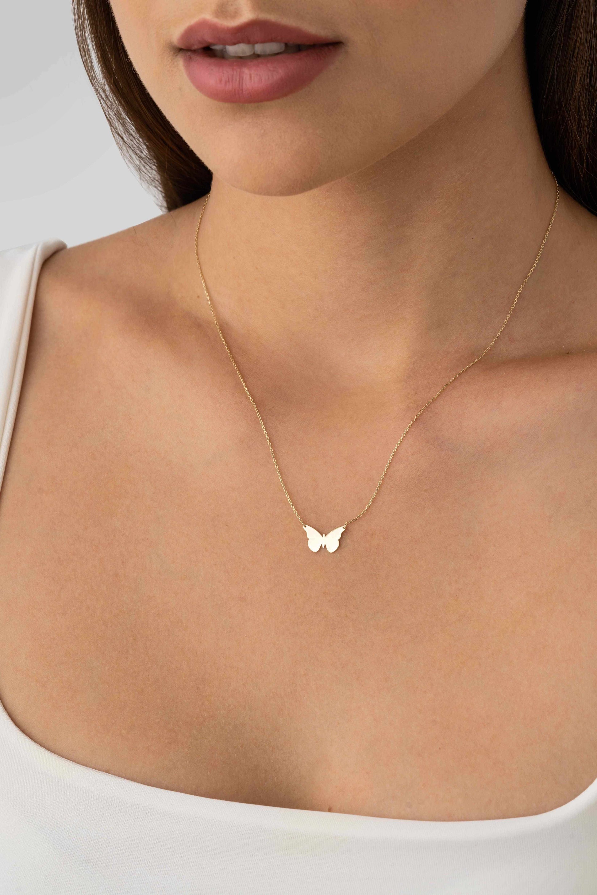 Elegant 14K gold butterfly charm necklace