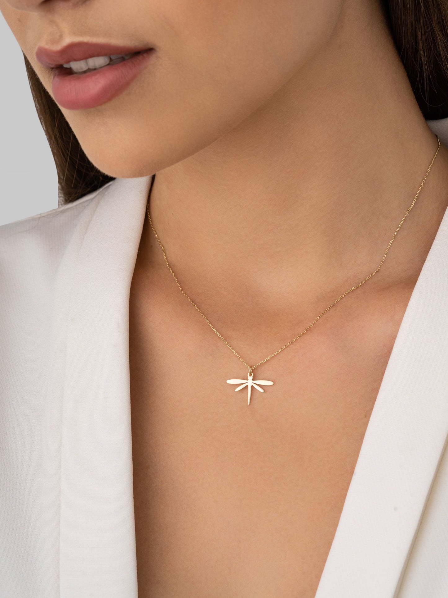 Gold dragonfly pendant necklace – embracing growth and strength