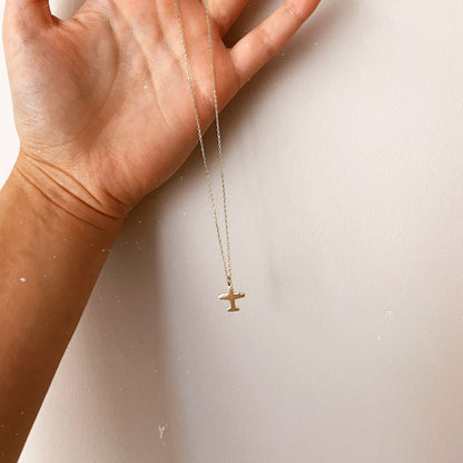 Minimalist airplane charm necklace in 14k gold