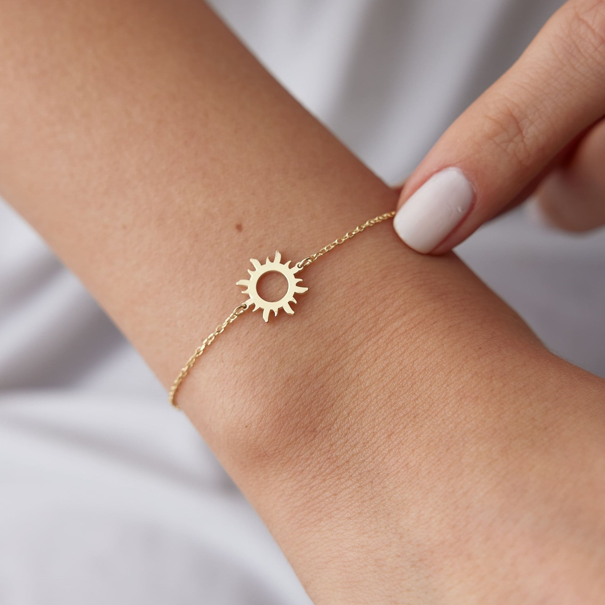 gold bracelet symbolizing light and positivity